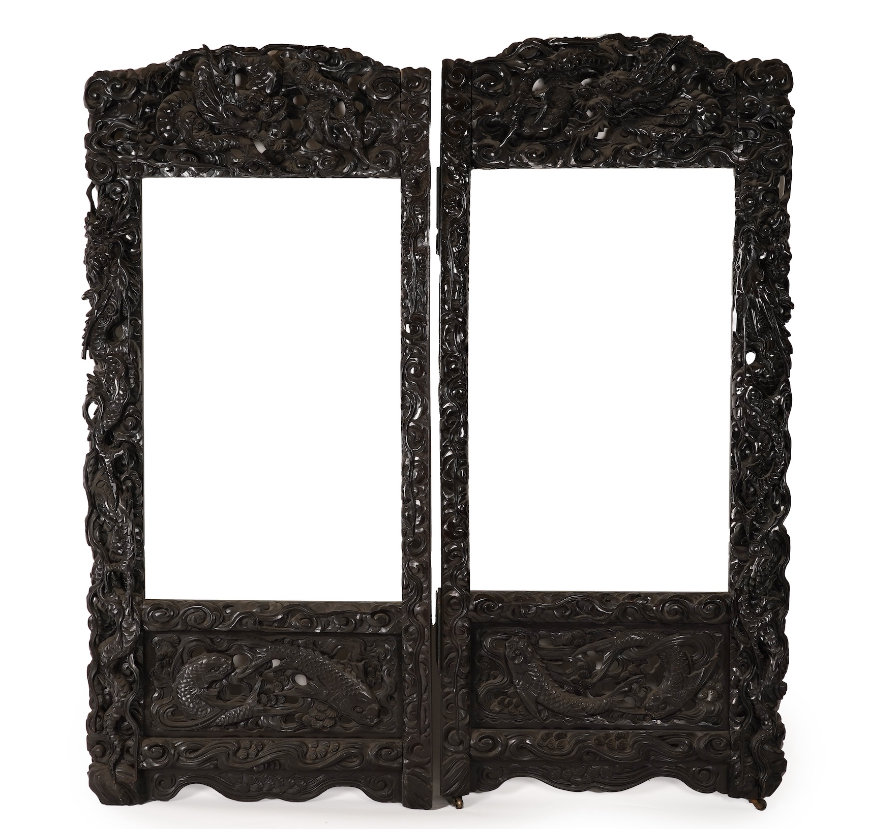 A pair of large Japanese carved hardwood ’dragon’ screen frames, Meiji period